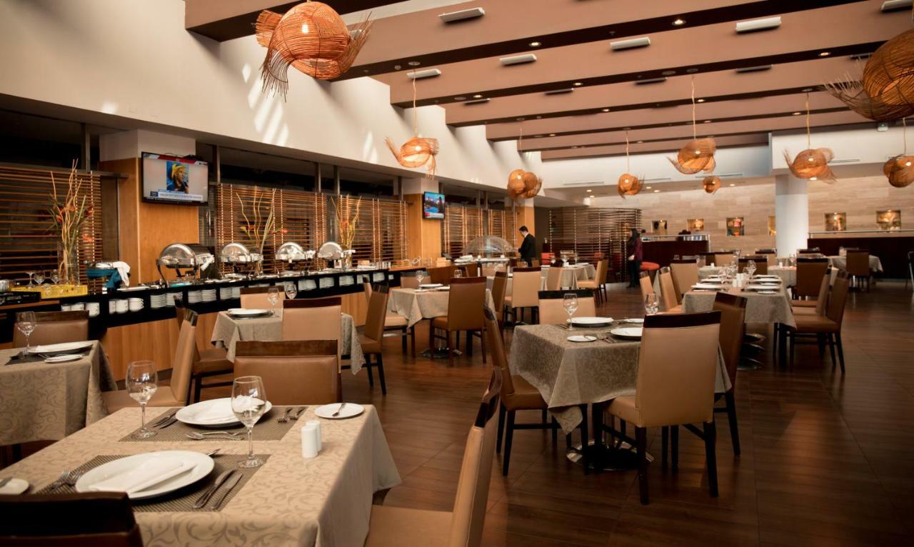 Mds Hotel Calama Extérieur photo The interior of the restaurant