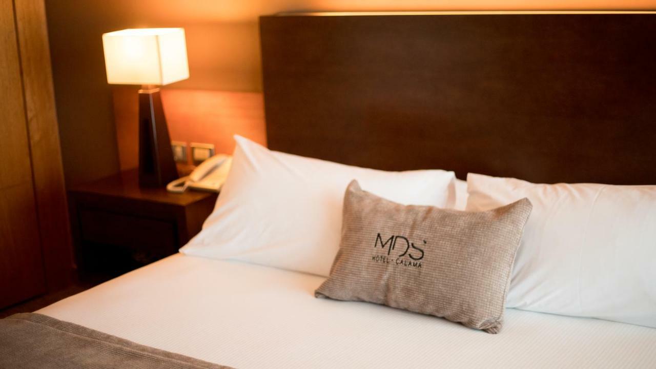 Mds Hotel Calama Extérieur photo A bed at the MÖS Hotel in Cologne, Germany