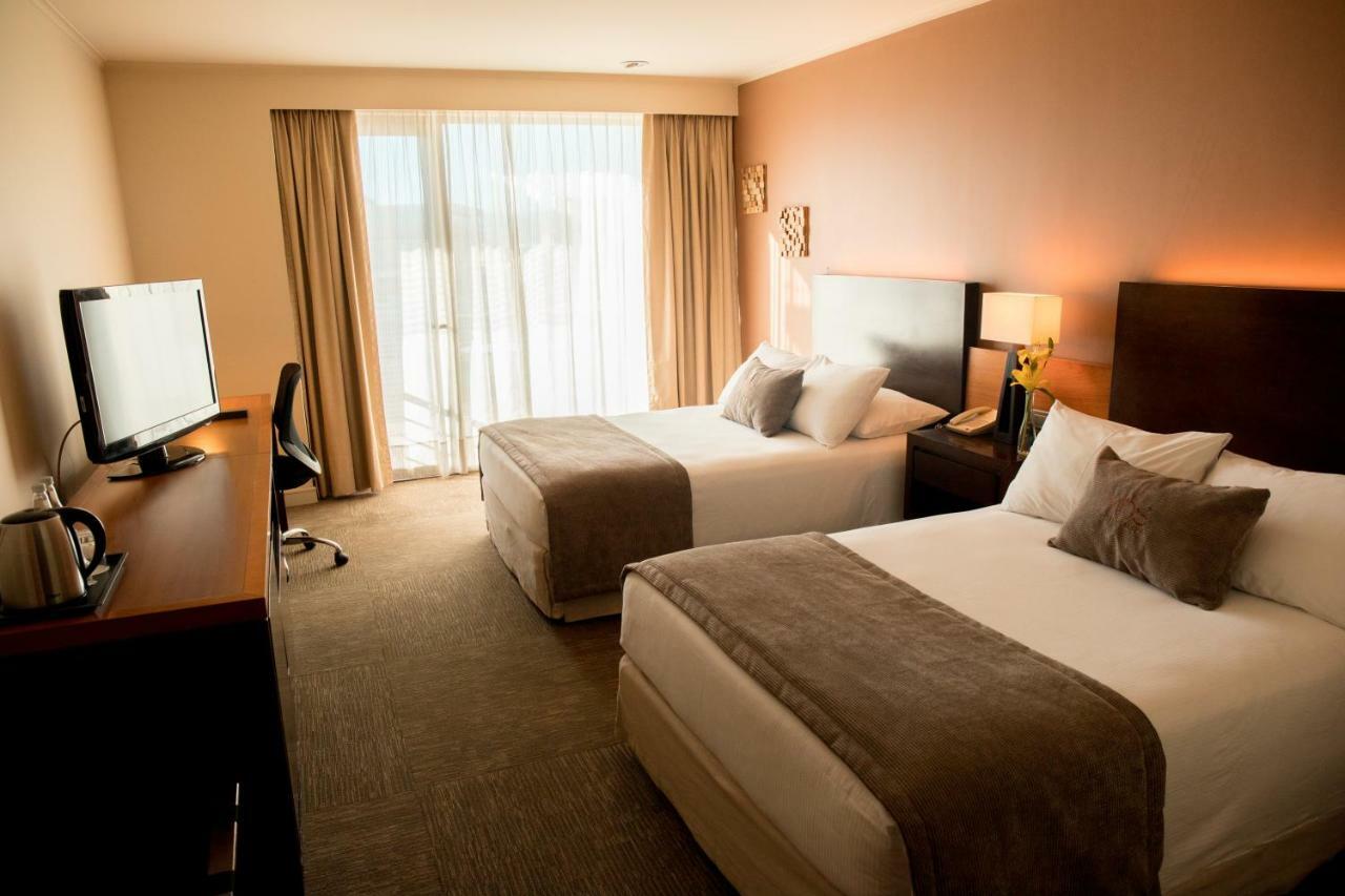 Mds Hotel Calama Extérieur photo A typical hotel room