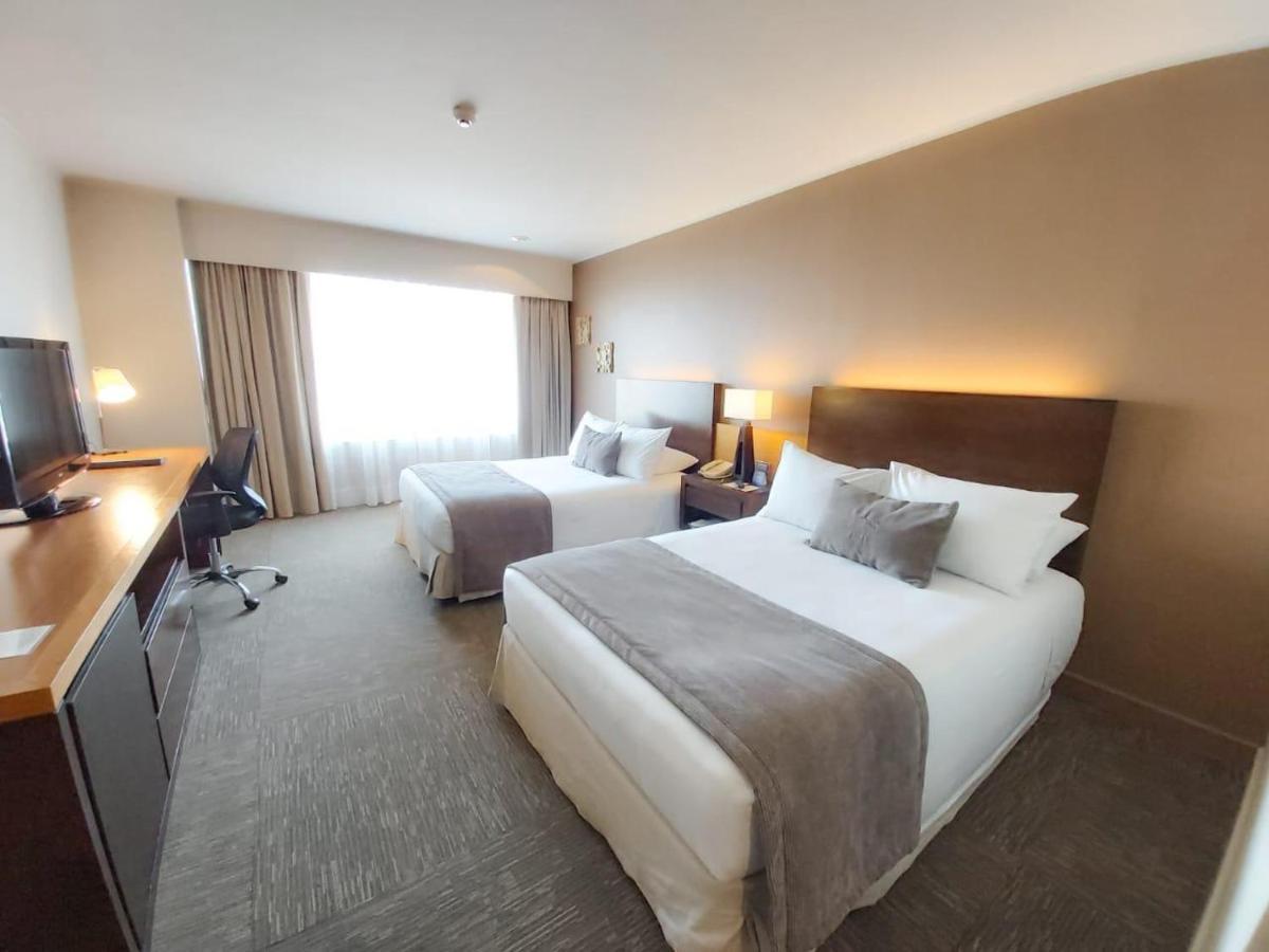 Mds Hotel Calama Extérieur photo A typical hotel room